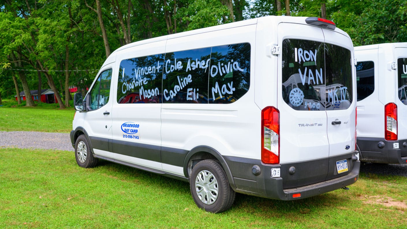Camp van with camper names written on window